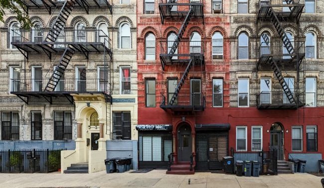 Block of old apartment buildings in the East Village neighborhood of Manhattan in New York City NYC