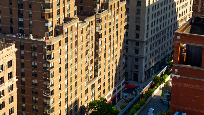 Aerial shot of Manhattan, New York City, taken from above the Upper West Side on a sunny afternoon in summer.