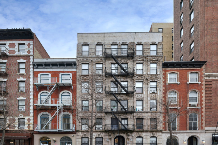 New York City old fashioned apartment buildings with external fire ladders