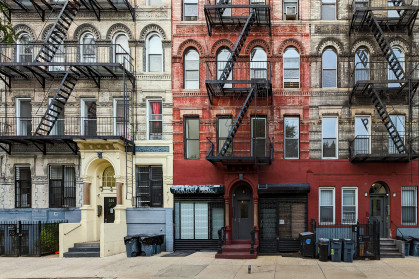 Block of old apartment buildings in the East Village neighborhood of Manhattan in New York City NYC