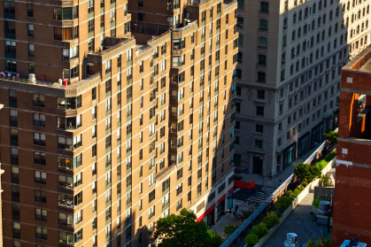 Aerial shot of Manhattan, New York City, taken from above the Upper West Side on a sunny afternoon in summer.