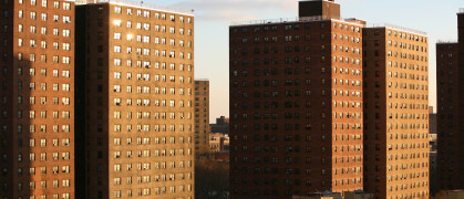 Sunset light on public housing project in Harlem, high angle view, New York City, NY, USA.