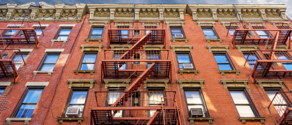 New-York building facades with fire escape stairs view from street