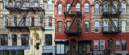 Block of old apartment buildings in the East Village neighborhood of Manhattan in New York City NYC