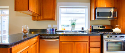 dated orange wood cabinets brick underground